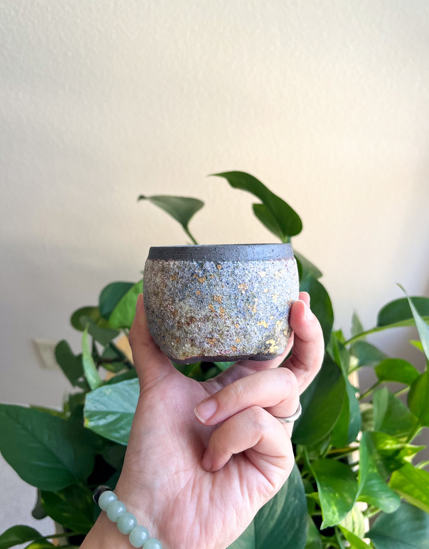 Handcrafted Woodfired Rough Clay Teacup (multi-gemstone glaze)