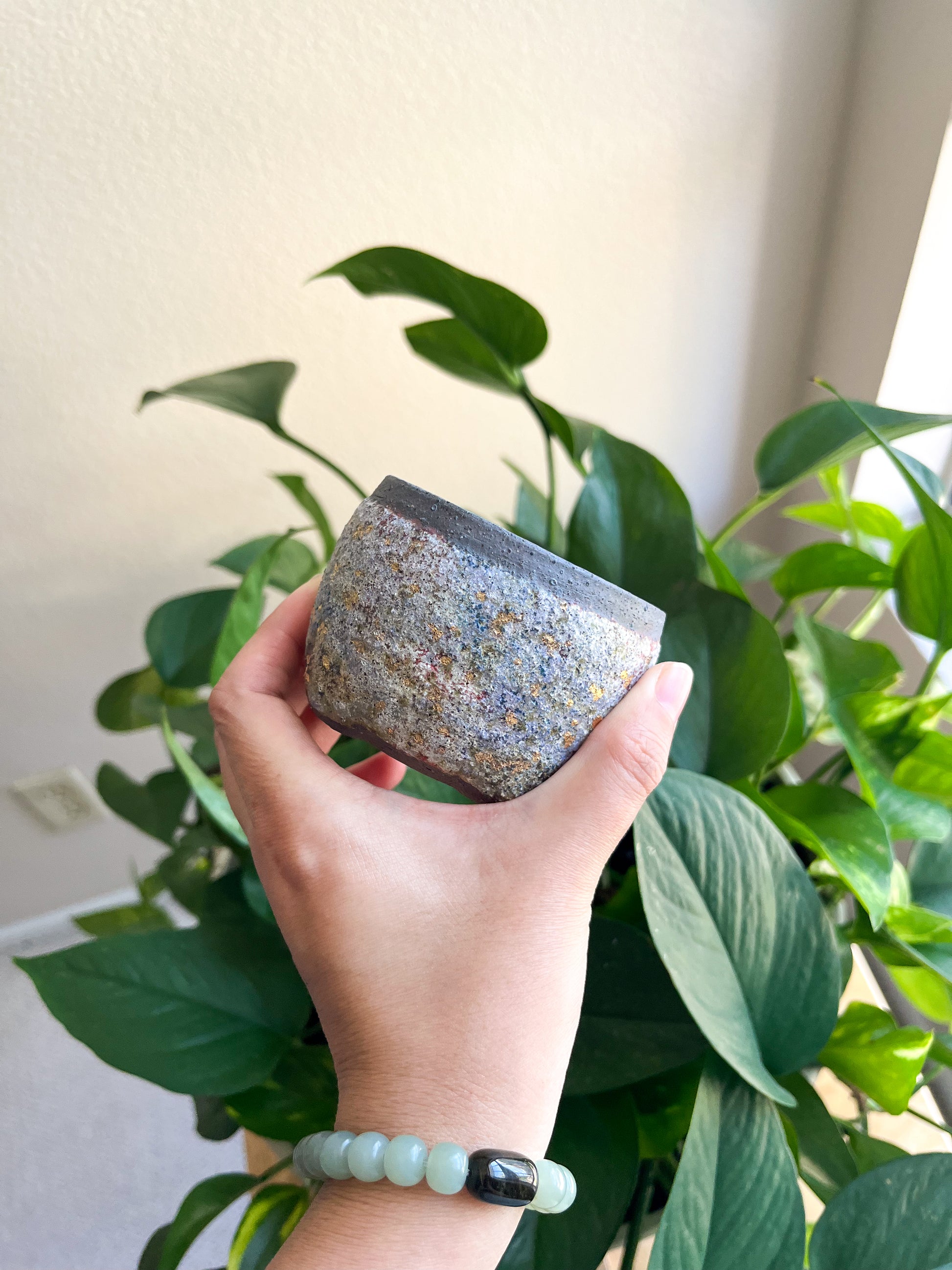 Handcrafted Woodfired Rough Clay Teacup (multi-gemstone glaze)